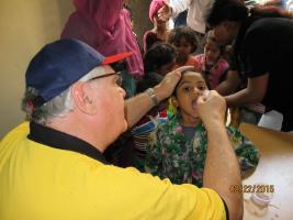 Club Member Greg Thacker vaccinating children in India against Polio